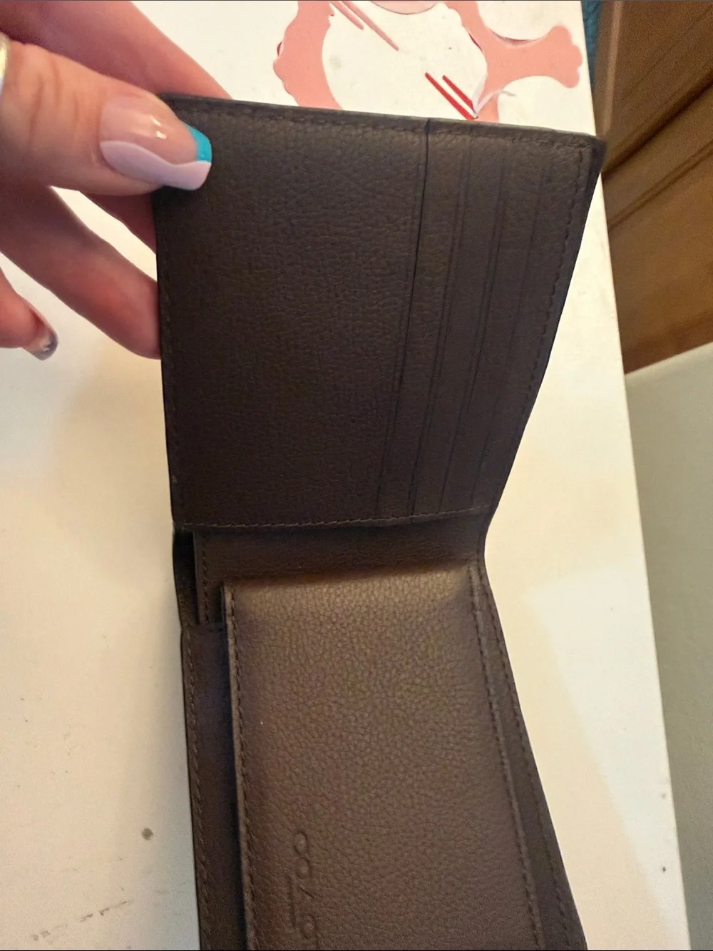 Coach Black Pebbled Leather Bi-Fold Wallet